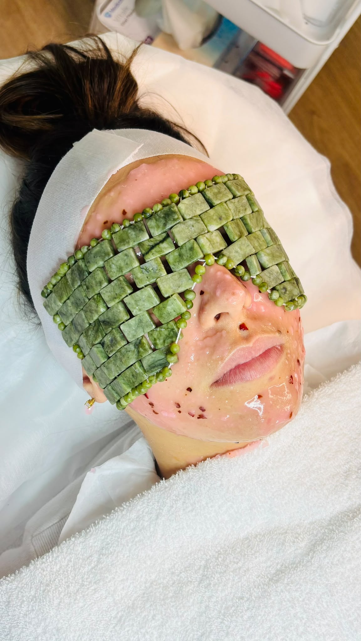 Facial ritual with jade gua sha stones at Fabeauty Private Studio